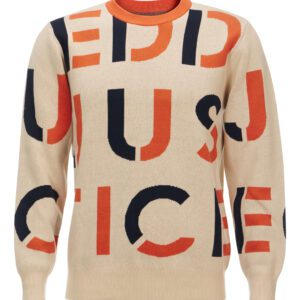 A beige sweater with an orange and black pattern on it.