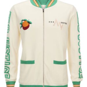 A white jacket with green trim and an orange on the front.